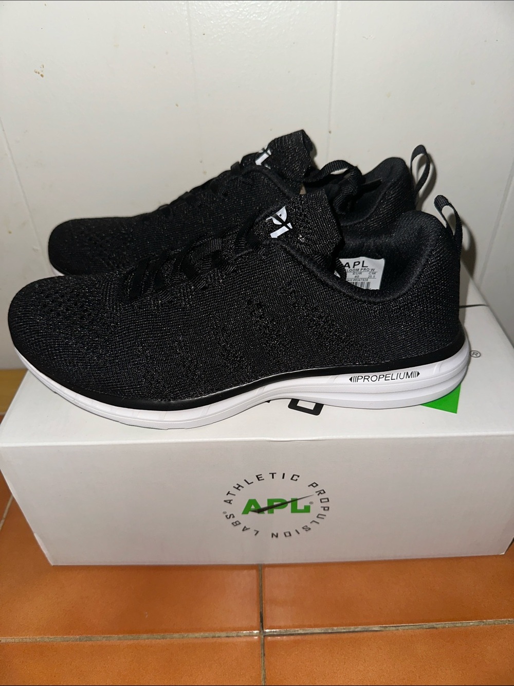 APL women TechLoom Athletic Sneakers in Black/White